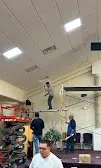 Commercial ceiling lighting installation in retail space